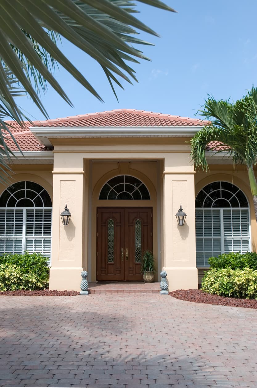 Florida home front entry with impact doors and windows